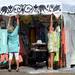 Vendors set up their tent off of E. Liberty St. in downtown Ann Arbor on Tuesday morning, July 16, 2013. Melanie Maxwell | AnnArbor.com